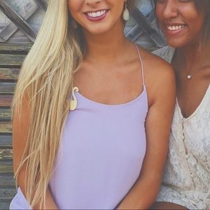 Light purple shift dress. Hits about mid thigh